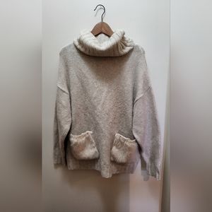 ZARA oversized oatmeal colour turtle neck sweater with fuzzy pockets.